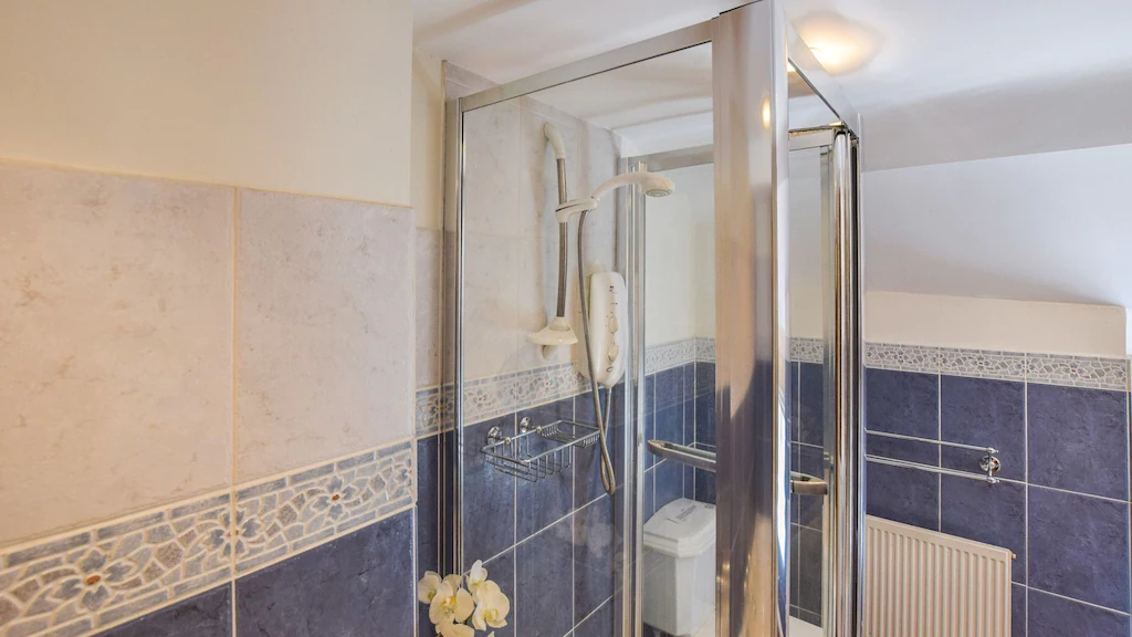 Bath and shower in the family bathroom