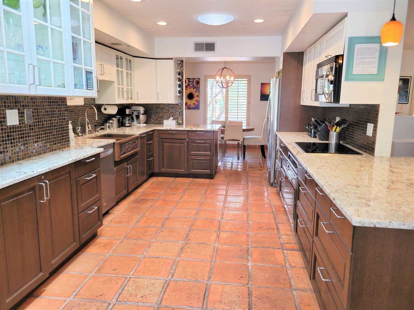 The kitchen is well-equipped with top-notch Wolf and GE Profile appliances, and if desired, you can hire our exclusive Greek Chef.