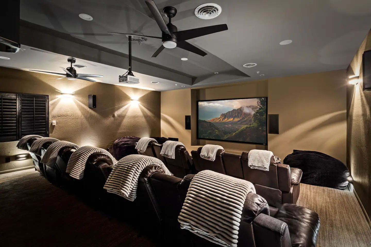 Indulge in a spacious theater room with plenty of comfortable seating for your entertainment pleasure.