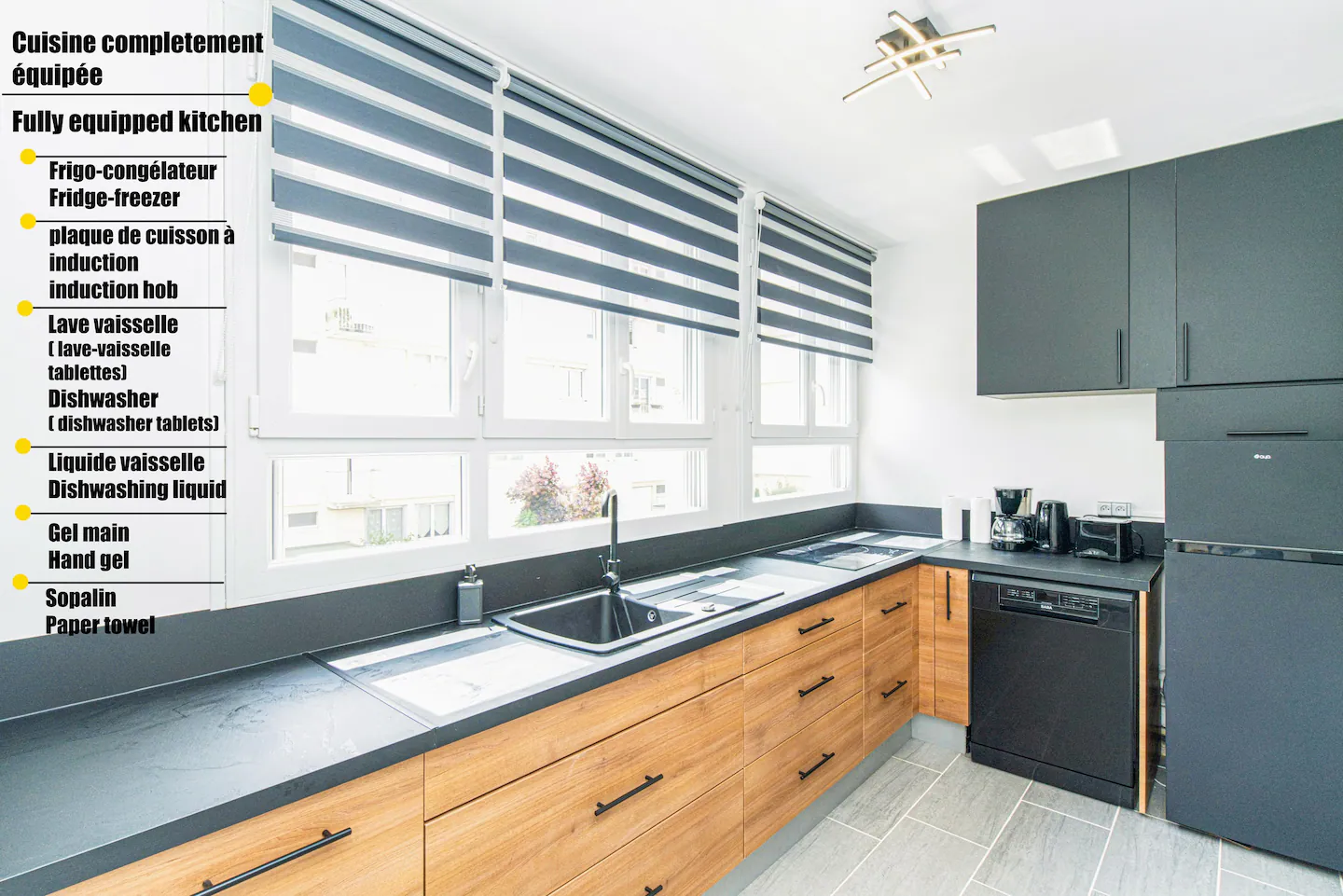 A fully equipped kitchen with appliances and supplies for all your cooking needs, like a fridge-freezer, oven, coffee machine, and more.