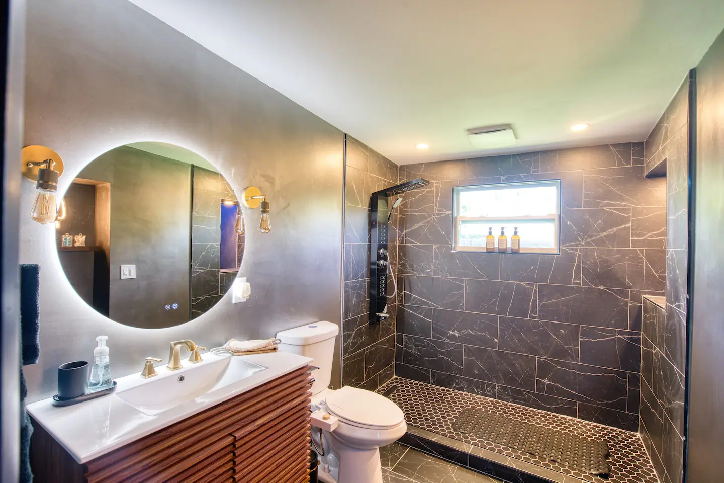 Large space for bathroom with great shower.