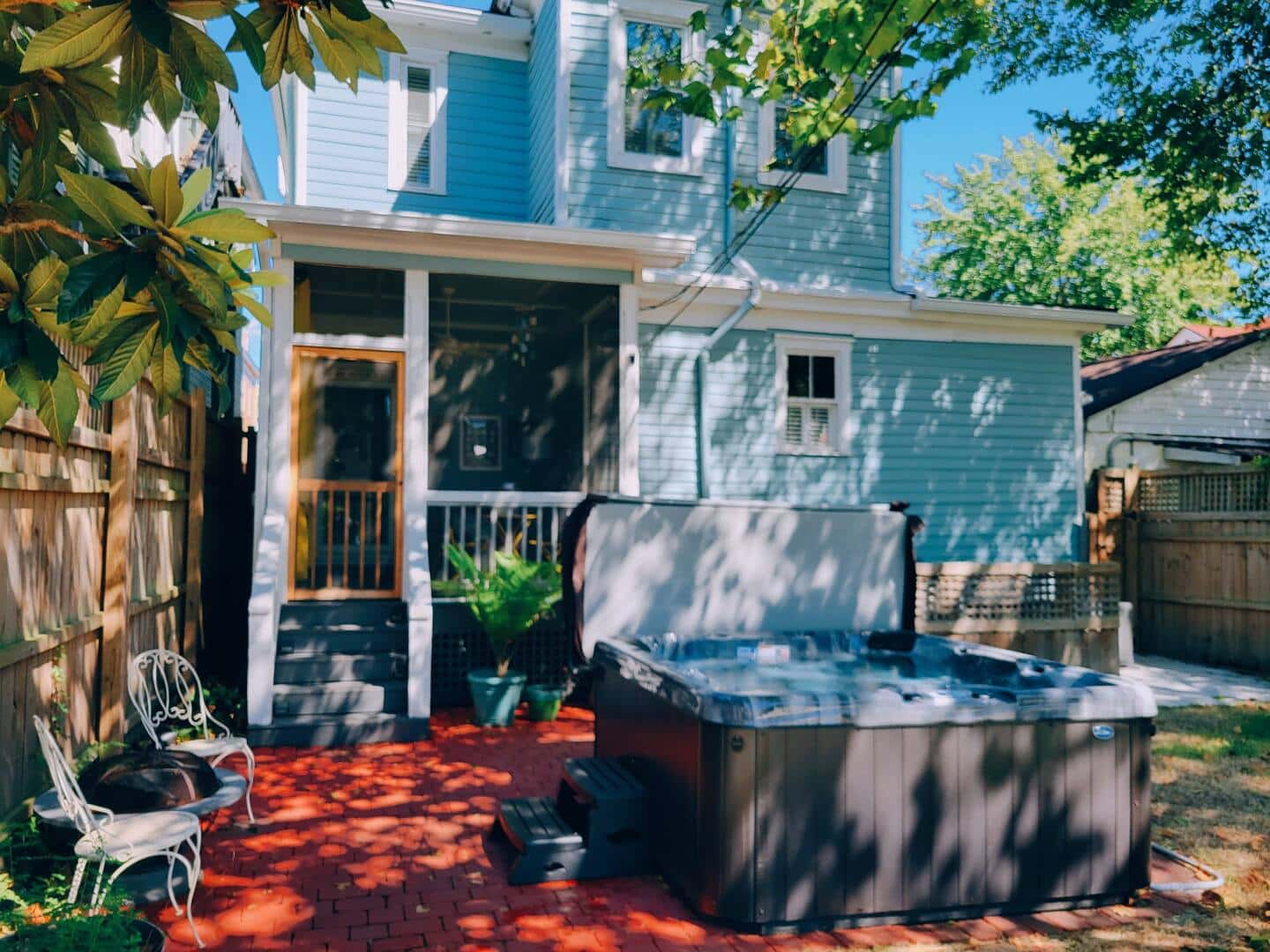 Hot tub in the backyard for guests enjoyment