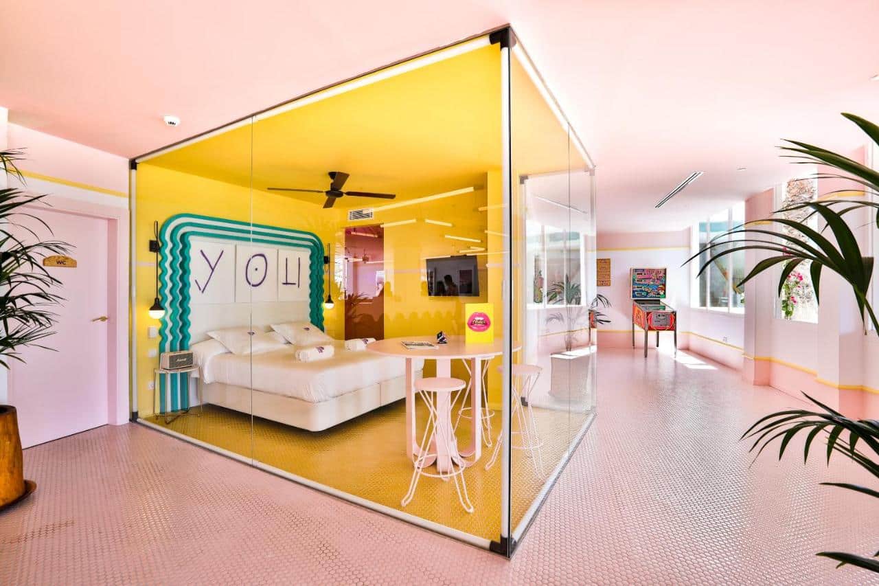 Spacious bedroom and fun lighting.